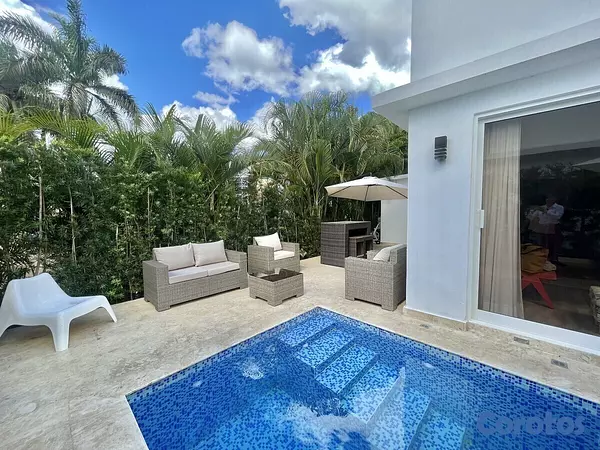 casas vacacionales y villas - En venta iluminada casa amueblada en Juan Dolio, en lo mejor de Metro Country Cl 9