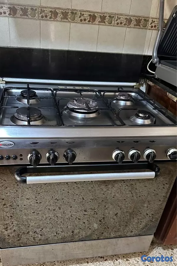 electrodomesticos - VENDO ESTUFA CROMADA NO SE OXIDA USADA CON HORNO Y GRATINADOR GRANDE NEGÓCIABLE  3