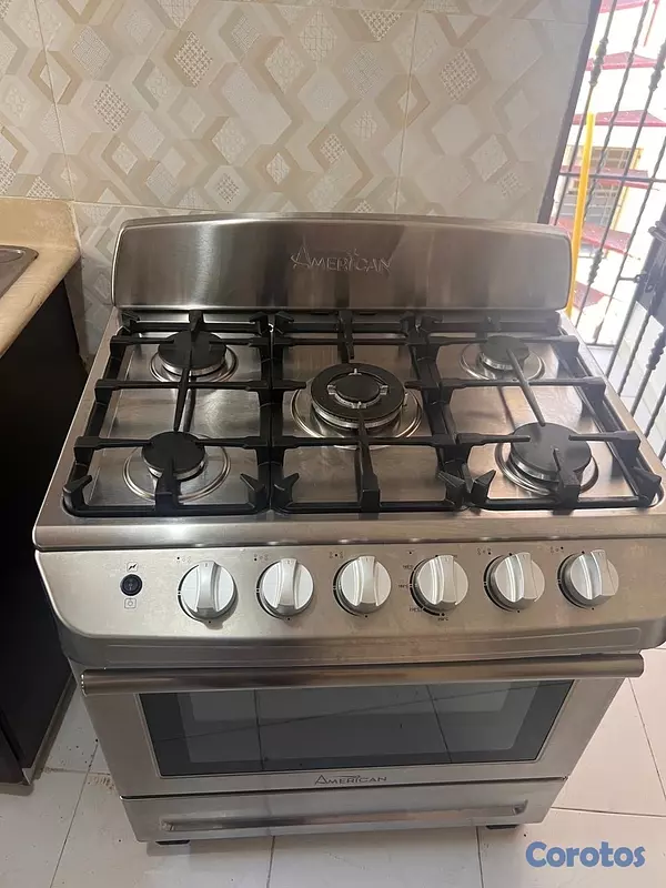 electrodomesticos -  Estufa American de 6 hornillas  tiene 7 meses de comprada y usada  3