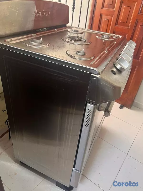 electrodomesticos -  Estufa American de 6 hornillas  tiene 7 meses de comprada y usada  4