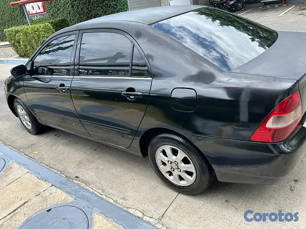 carros - Toyota Corolla 2002 el que trae la casa Delta  9