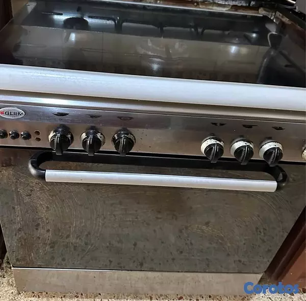 electrodomesticos - VENDO ESTUFA CROMADA NO SE OXIDA USADA CON HORNO Y GRATINADOR GRANDE NEGÓCIABLE  5