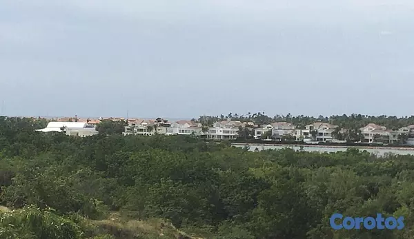 solares y terrenos - Solar Frente a casa de Campo y Rio Chavon de 1106651 metros  3