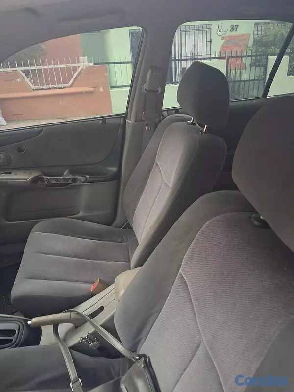carros - Se vende Mazda 323 año 2002 4