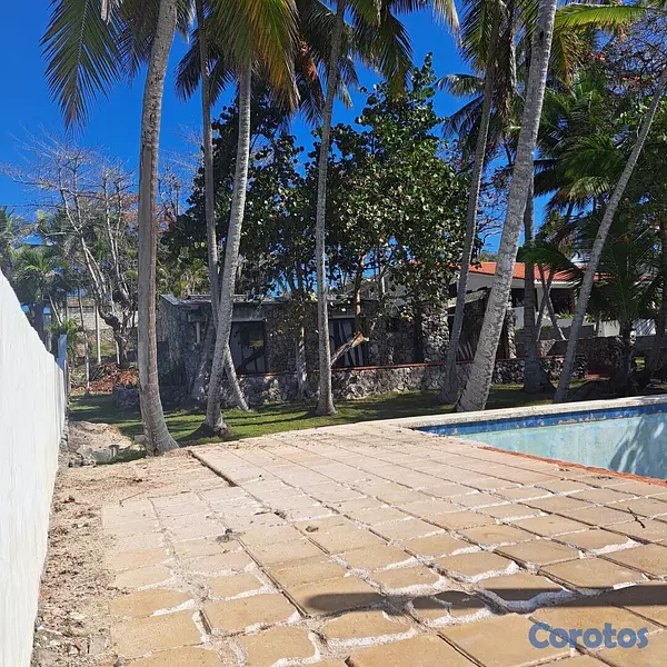 solares y terrenos - Vendo Terreno Boca Chica Zona Exclusiva Frente Al Mar
con Casa de 300 metros 
 9