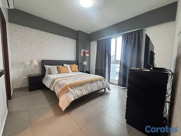 apartamentos - vendo amueblado Serrallés piso 7 una habitación 1.5 baños dos parqueos balcón  9