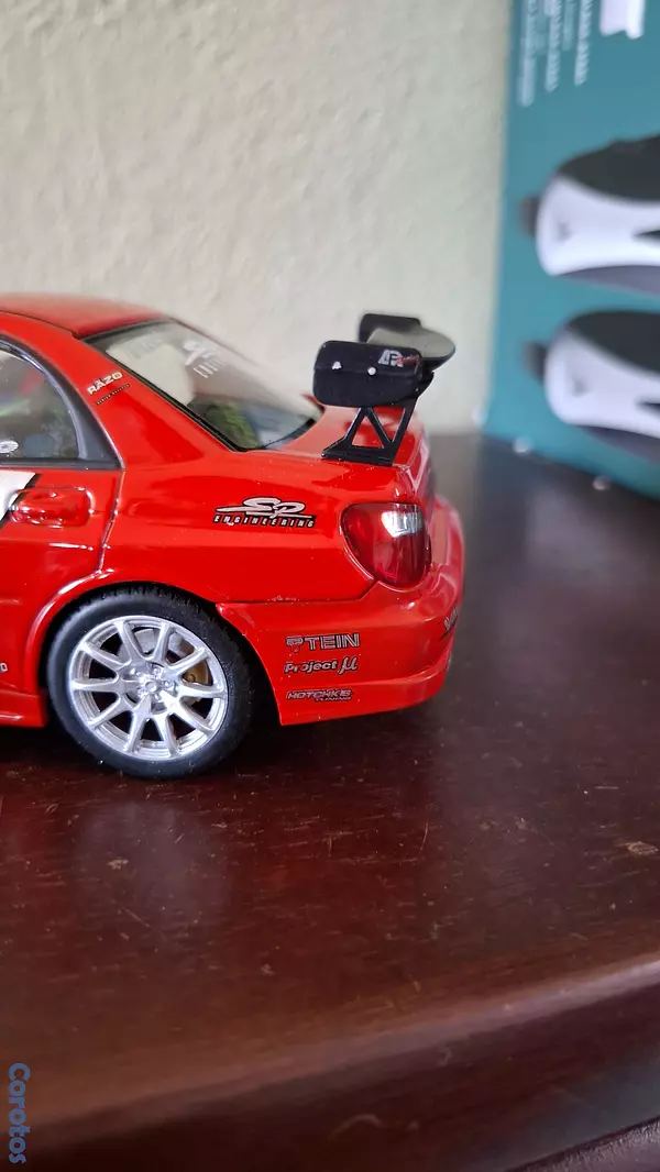 hobby y coleccion - Subaru Impreza wrx sti, escala 1.24  7