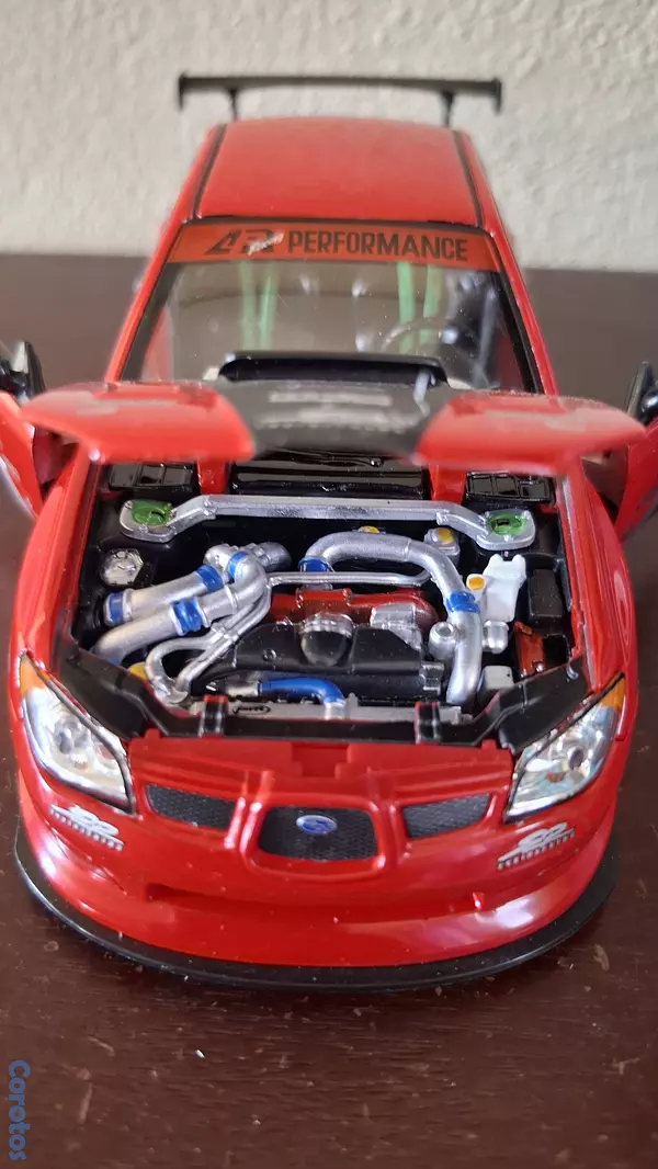 hobby y coleccion - Subaru Impreza wrx sti, escala 1.24  3
