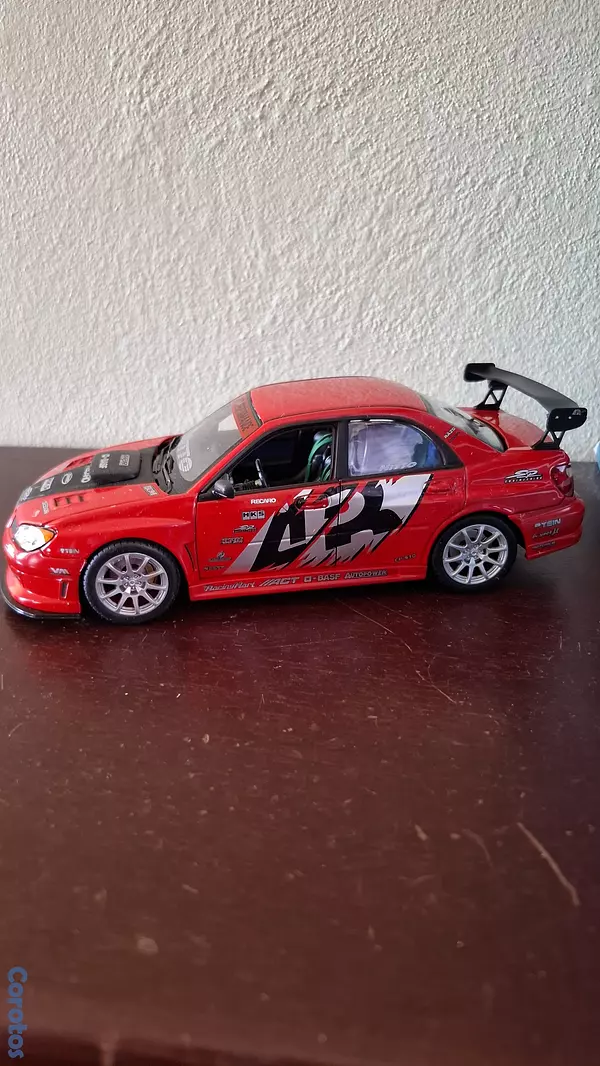 hobby y coleccion - Subaru Impreza wrx sti, escala 1.24  2