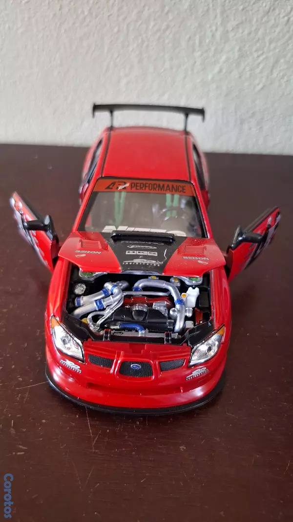 hobby y coleccion - Subaru Impreza wrx sti, escala 1.24  4