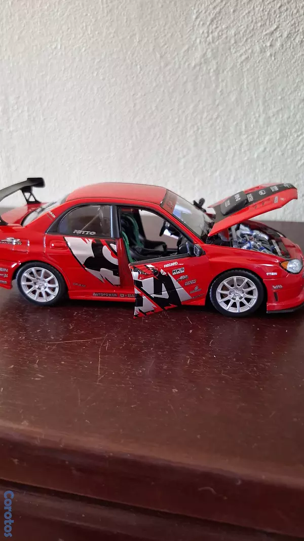 hobby y coleccion - Subaru Impreza wrx sti, escala 1.24  5
