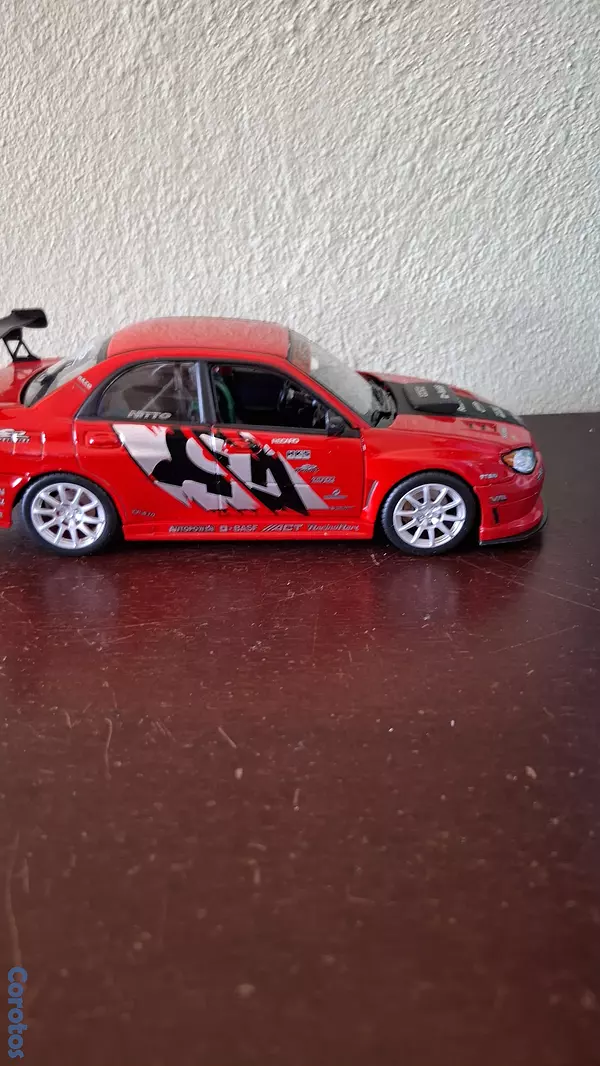 hobby y coleccion - Subaru Impreza wrx sti, escala 1.24  9