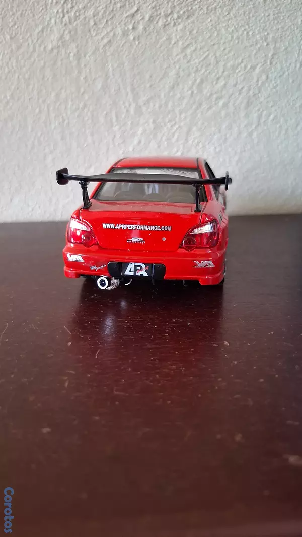 hobby y coleccion - Subaru Impreza wrx sti, escala 1.24  10