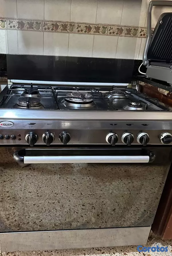electrodomesticos - VENDO ESTUFA CROMADA NO SE OXIDA USADA CON HORNO Y GRATINADOR GRANDE NEGÓCIABLE  2